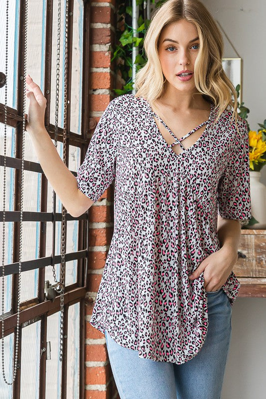 Heimish Full Size Short Sleeve Crisscross Animal Babydoll Top Plus Size OutfitFlow