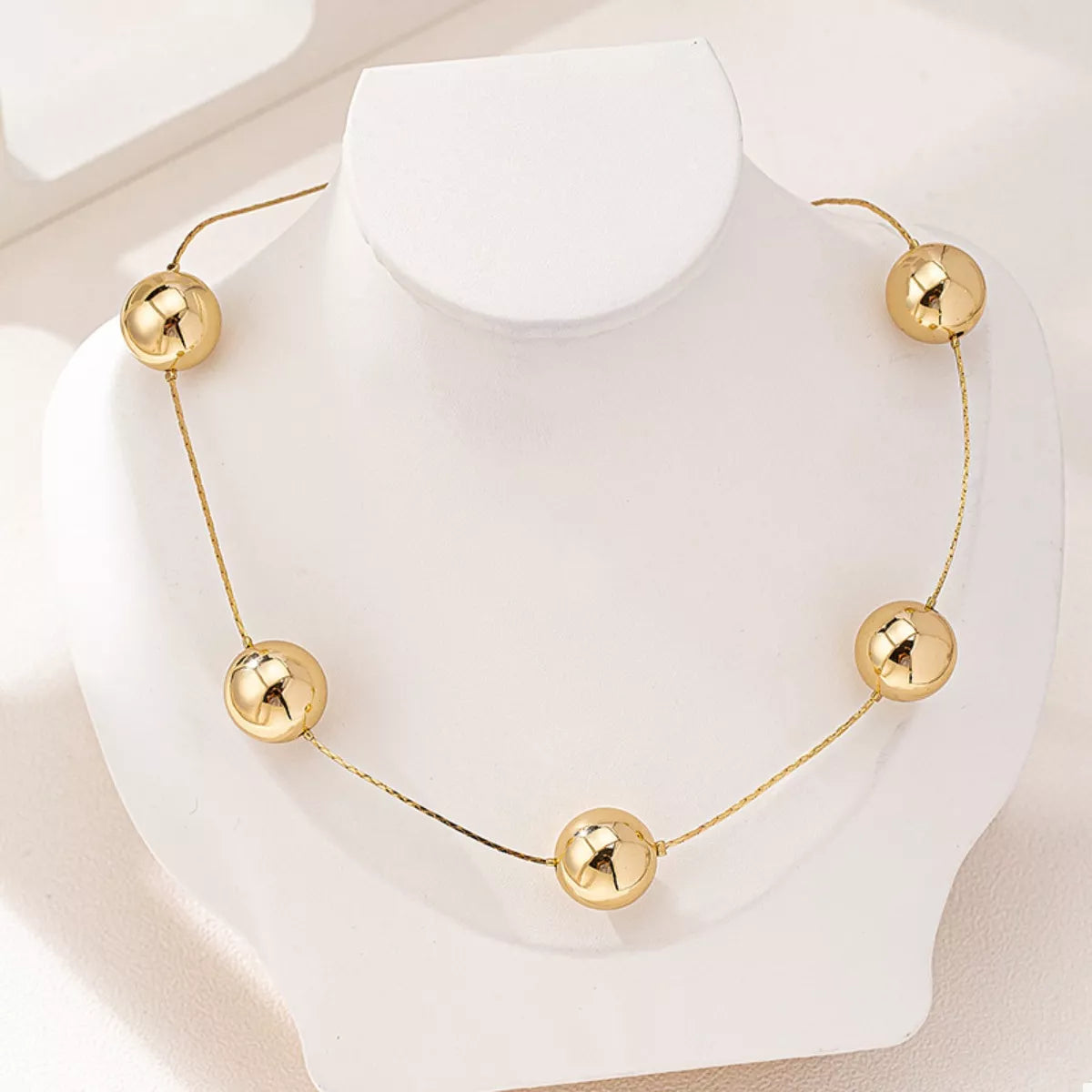 Golden Sphere Statement Necklace OutfitFlow