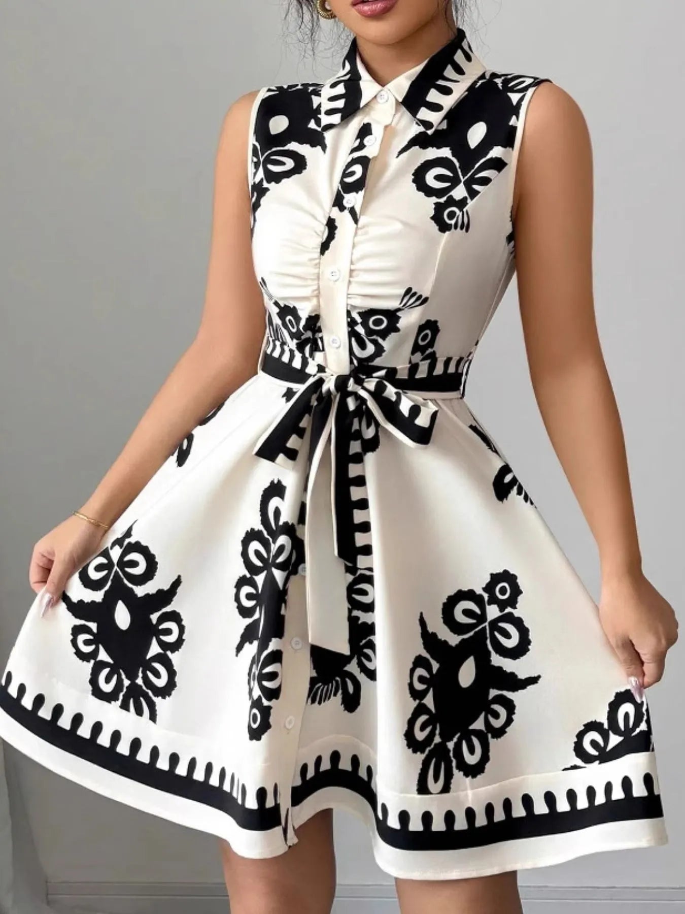 Printed Sleeveless Tie Waist Mini Dress OutfitFlow