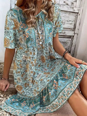 Printed Tie Neck Short Sleeve Mini Dress Peacock Blue OutfitFlow