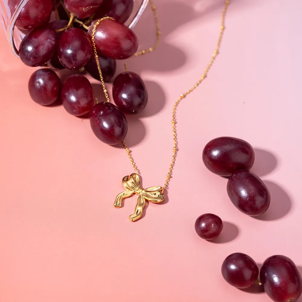 Stainless Steel Bow Pendant Necklace OutfitFlow