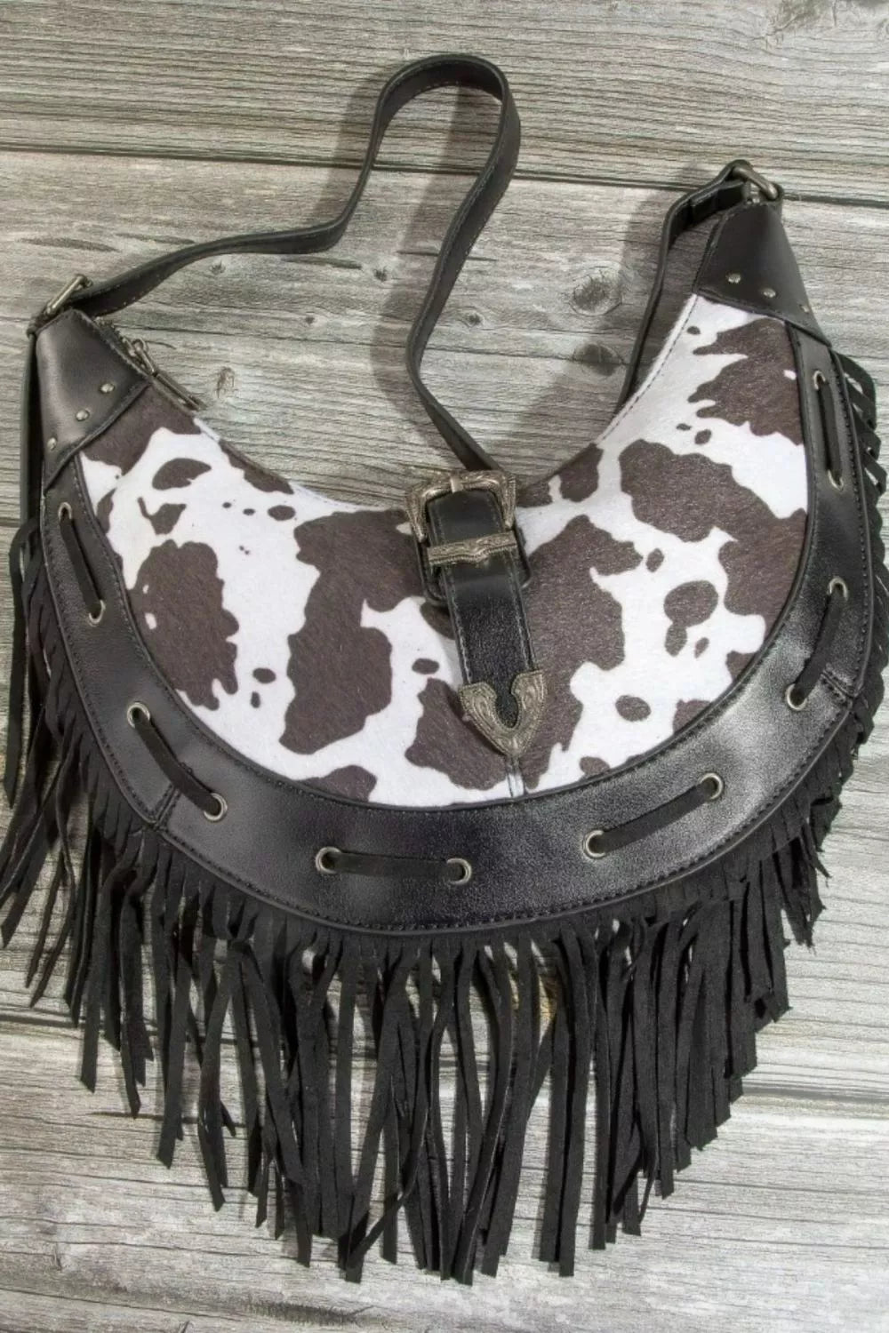 Fame Cow Print Faux Leather Fringe Hobo Bag OutfitFlow