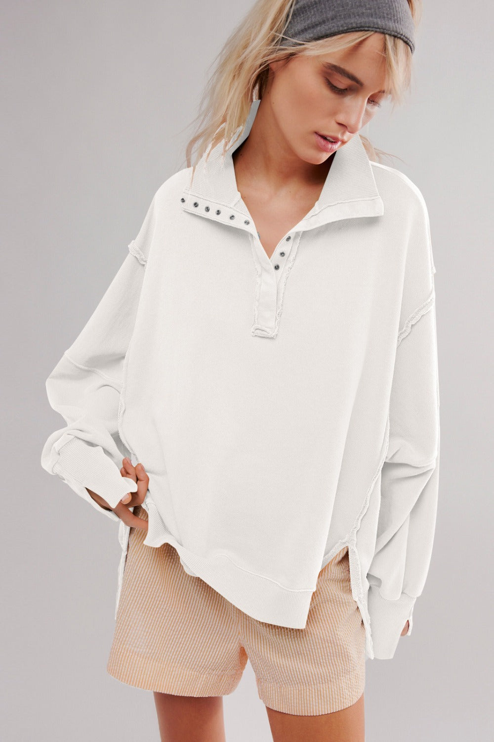 Outfit Flow - Exposed Seam Side Slit Long Sleeve Sweatshirt