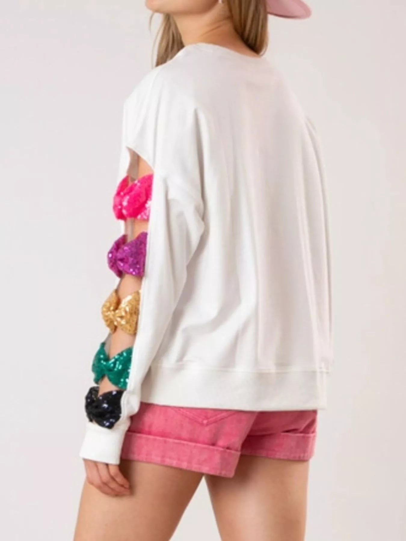 Sequin Bow Cutout Round Neck Sweatshirt OutfitFlow